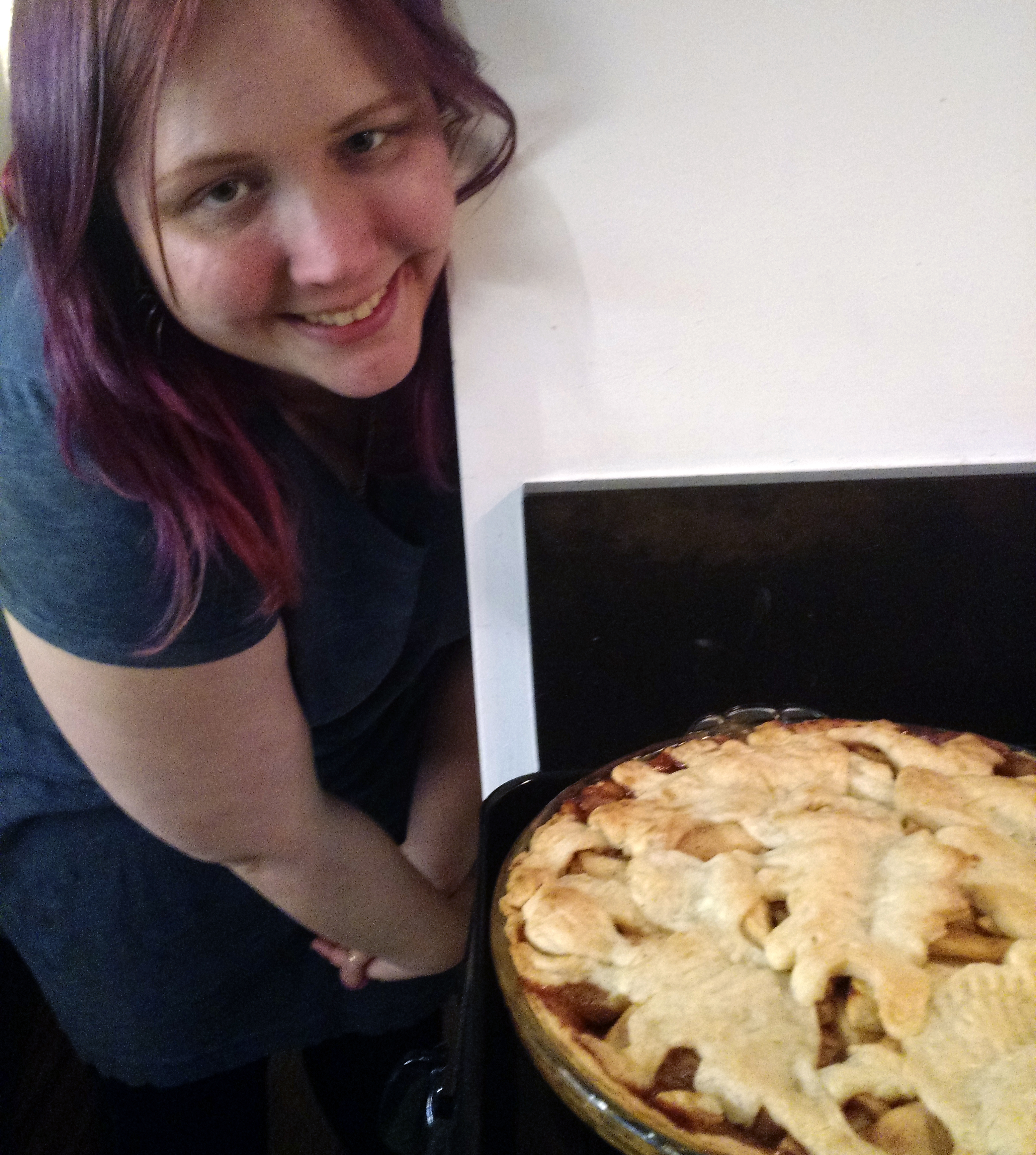 Presenting the dinosaur pie to the birthday boy!